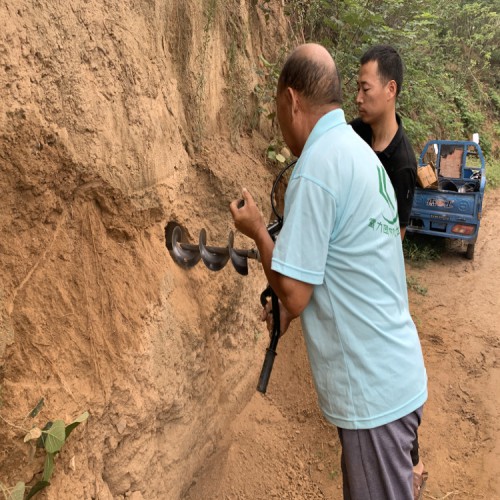 橫向打眼機 山體護(hù)坡橫向鉆孔機圖片